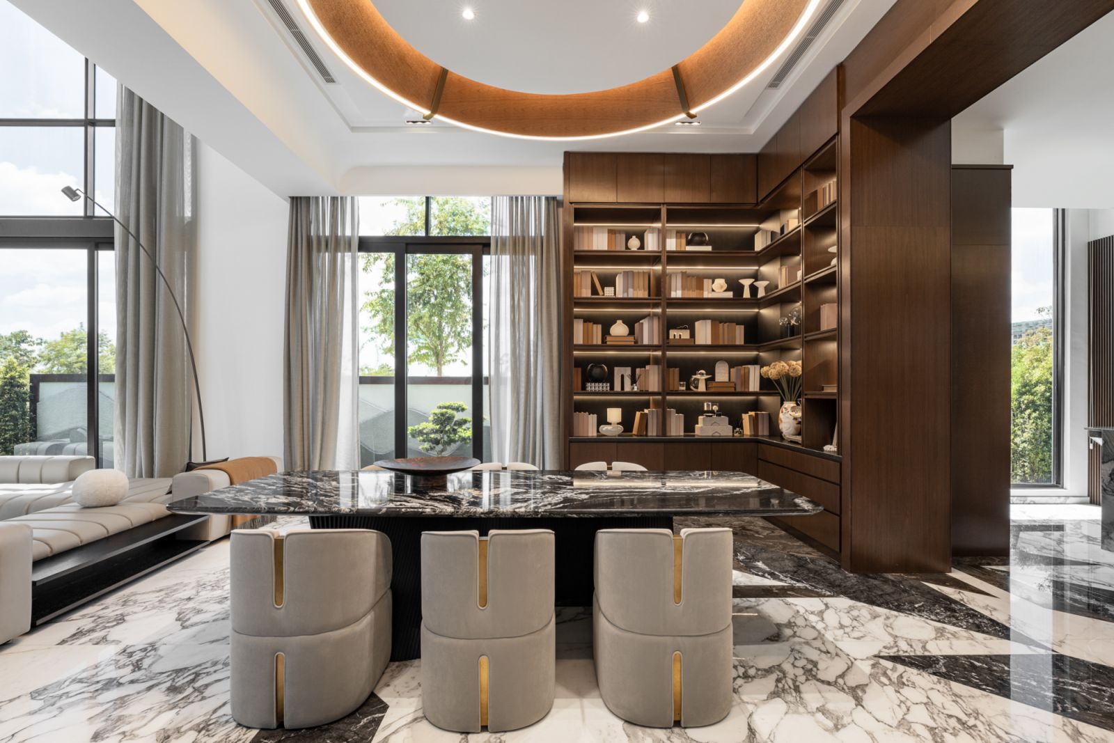 The dining area has a contrasting marble table