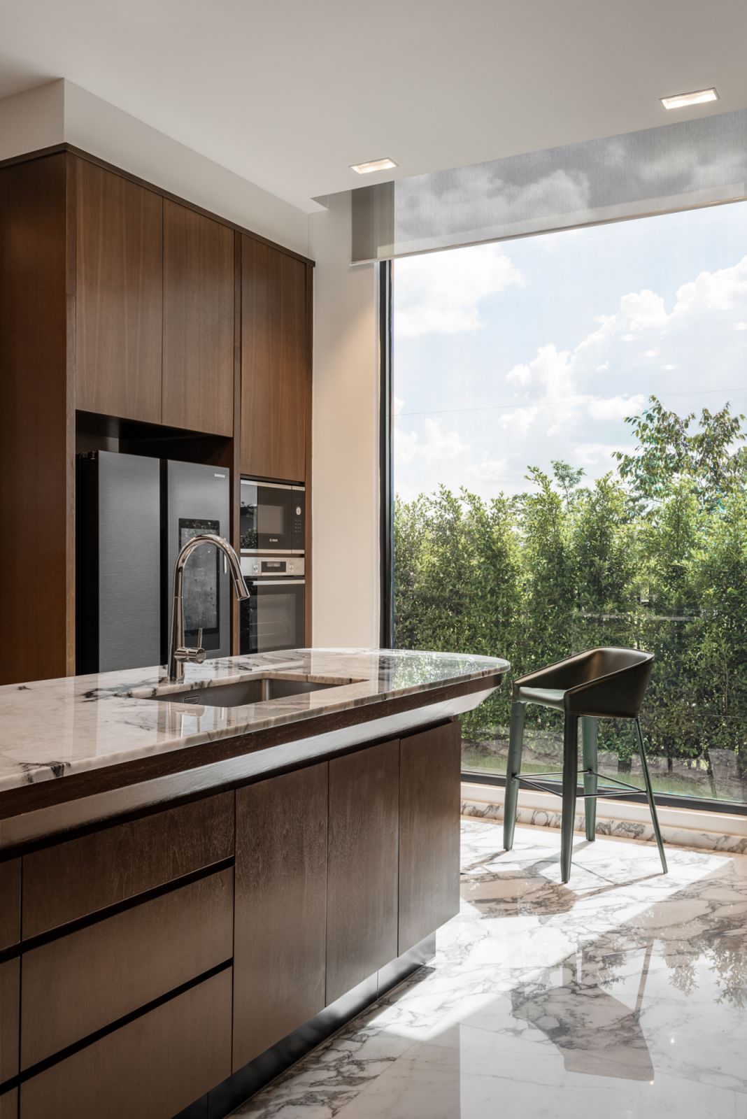 The kitchen has views of the greenery