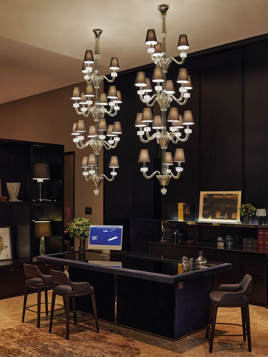 The charming Amsterdam chandeliers produce a warm, enveloping glow