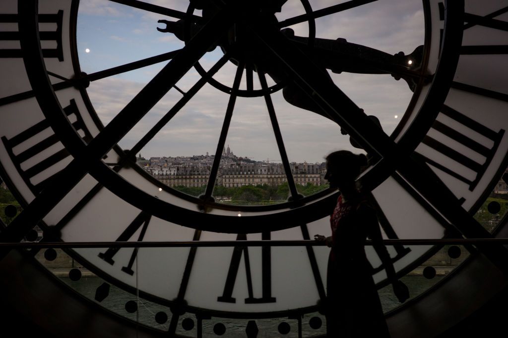 The city is being viewed from the iconic clock in the Musee d'Orsay in Paris, France, on April 25, 2024. The French capital is just a few months away from the start of the Olympic Games, which are due to begin on July 26, 2024. (Photo by Alberto Pezzali/NurPhoto via Getty Images)