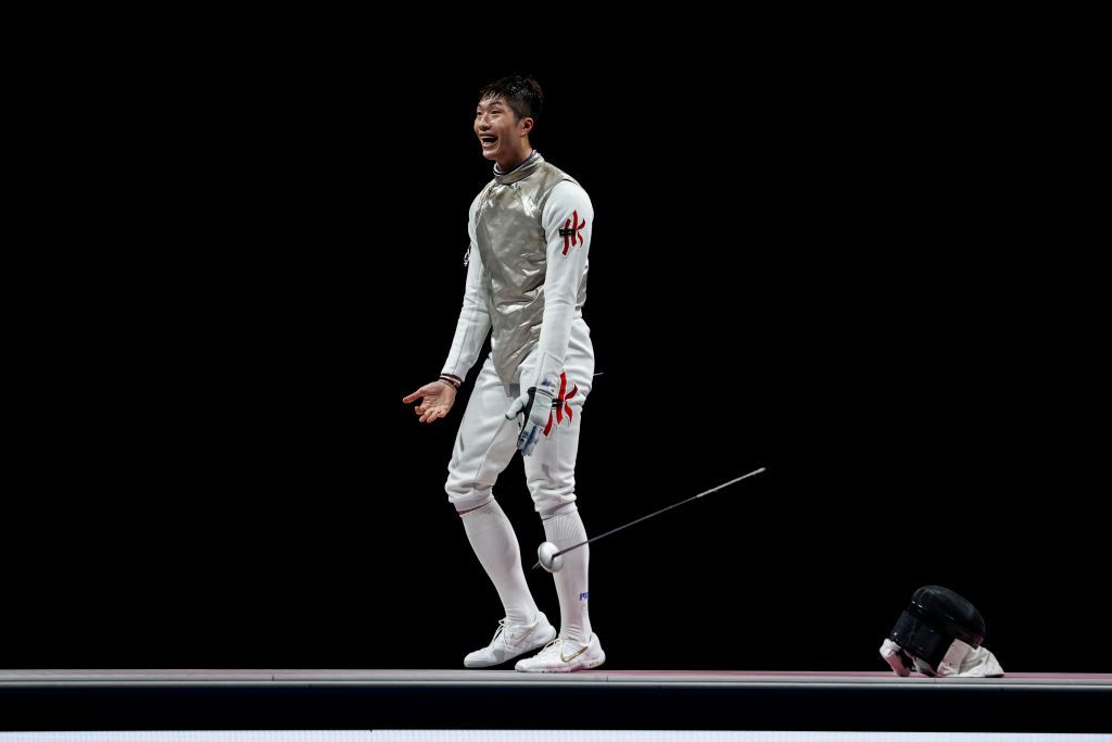 26 July 2021, Japan, Chiba: Fencing: Olympics, , foil singles, final, men, at Makuhari Messe Hall B. Cheung Ka Long of Hong Kong cheers for gold. Photo: Oliver Weiken/dpa (Photo by Oliver Weiken/picture alliance via Getty Images)