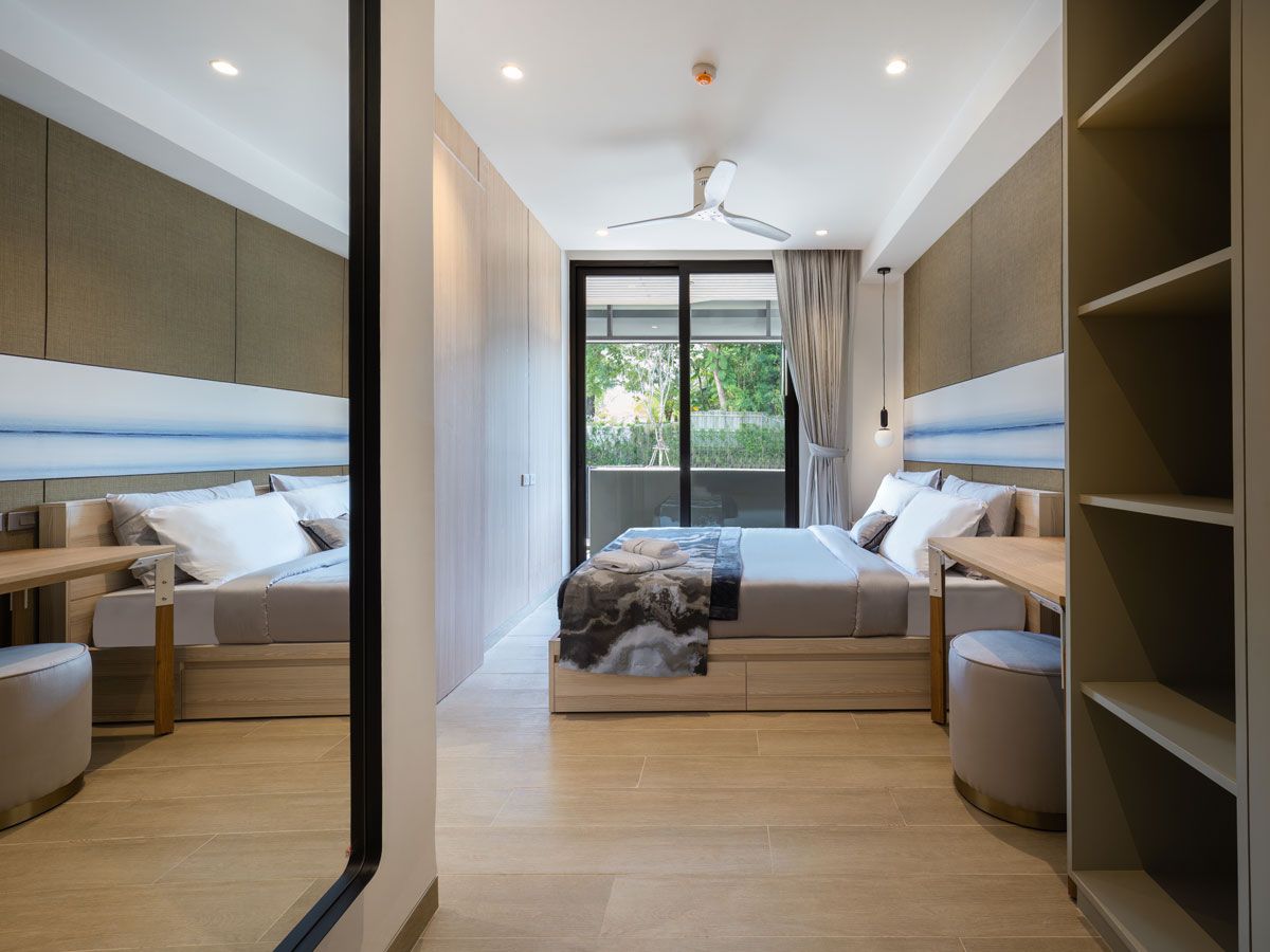 The master bedroom of a one-bedroom condo unit at Lakeview Residences, one of the projects at Laguna Lakelands