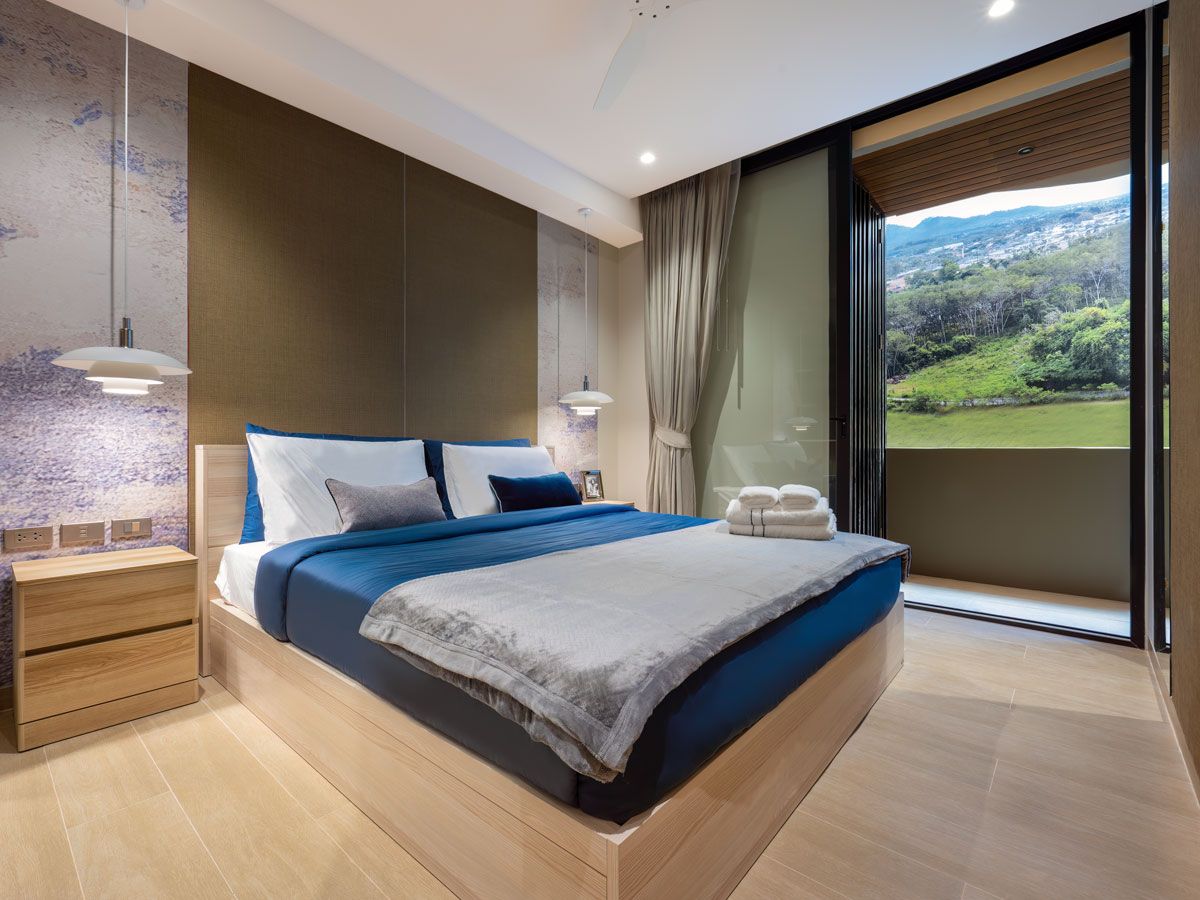 The bedroom of a three-bedroom condo unit at Lakeview Residences, one of the projects at Laguna Lakelands