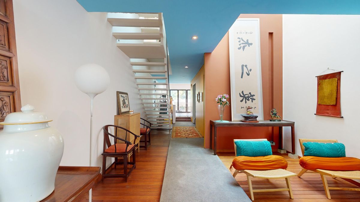 The intense colour palette featured throughout the home accentuate SCDA Architects' original spatial designs
