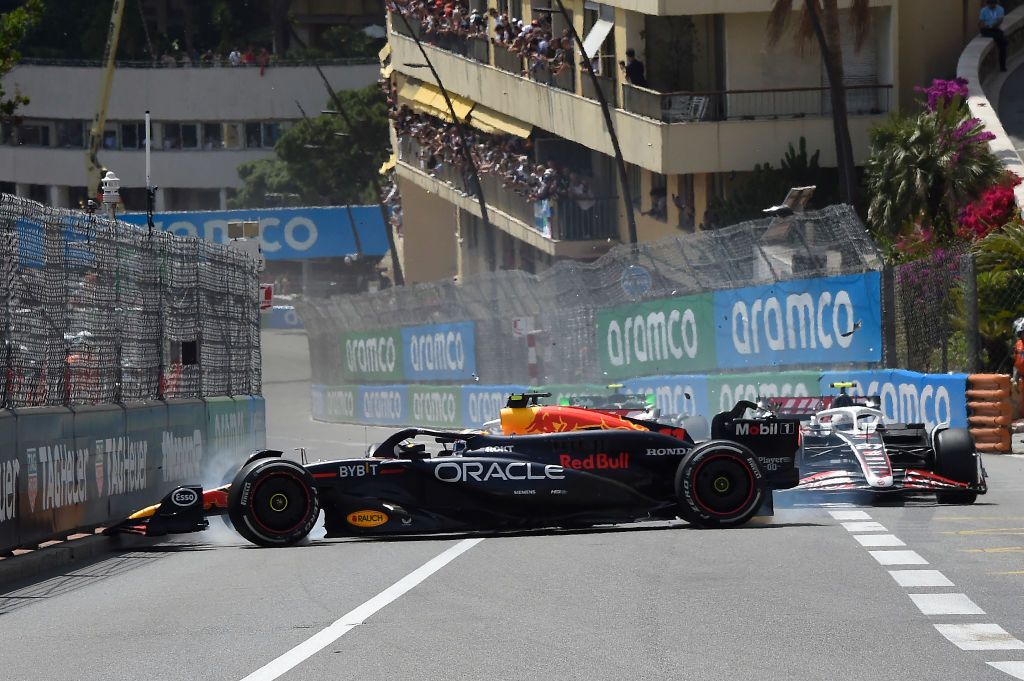 MONTE-CARLO, MONACO - MAY 26: Sergio Perez of Mexico driving the (11) Oracle Red Bull Racing RB20 and Kevin Magnussen of Denmark driving the (20) Haas F1 VF-24 Ferrari (obscured) crash at the start during the F1 Grand Prix of Monaco at Circuit de Monaco on May 26, 2024 in Monte-Carlo, Monaco. (Photo by Getty Images/Getty Images)