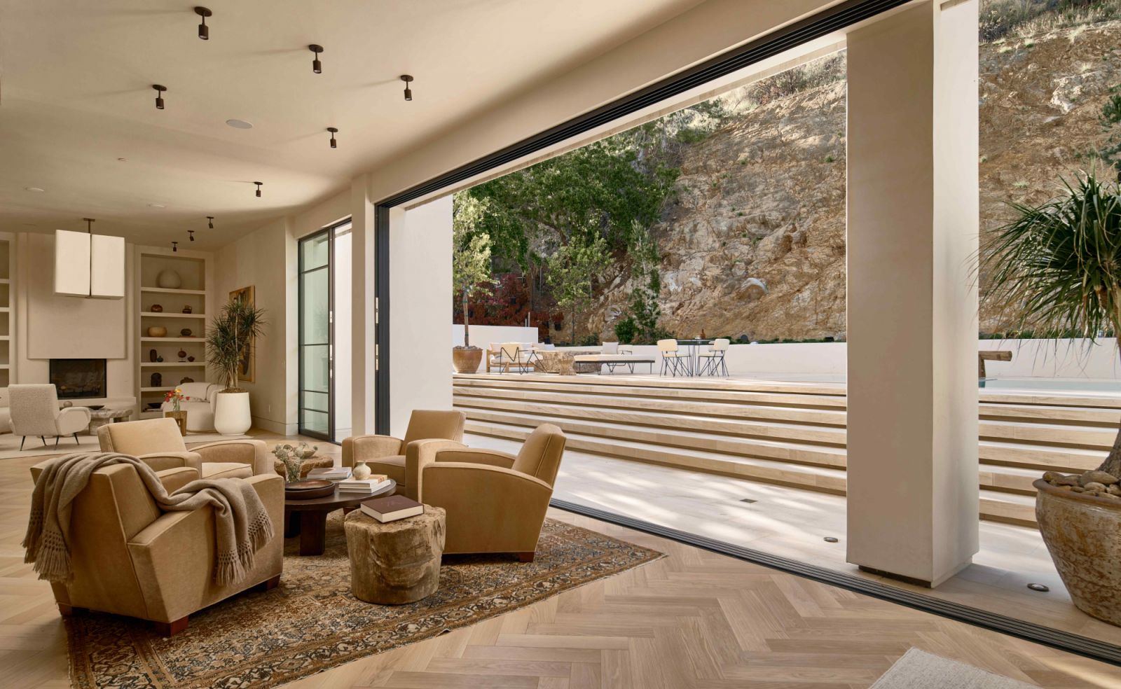 The expansive backyard through the 40-foot metal doors pocket (Photo: Nils Timms)