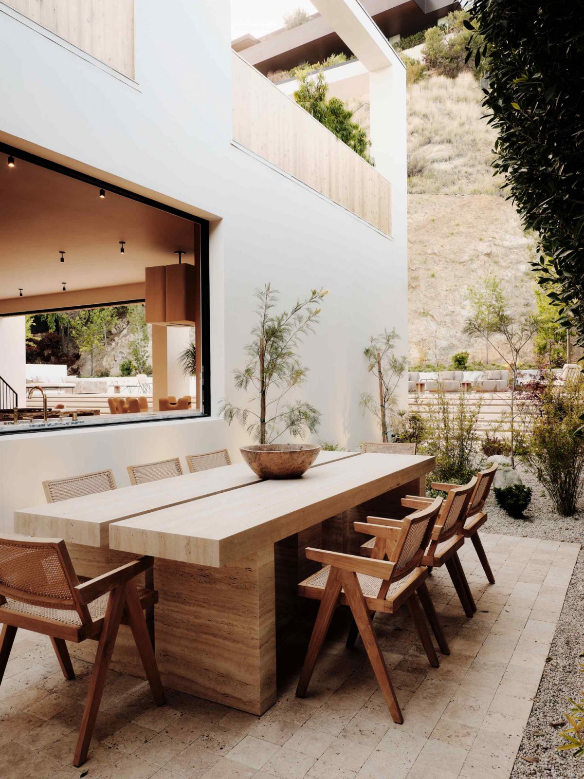 A private dining garden framed by citrus trees (Photo: Joe Fletcher)