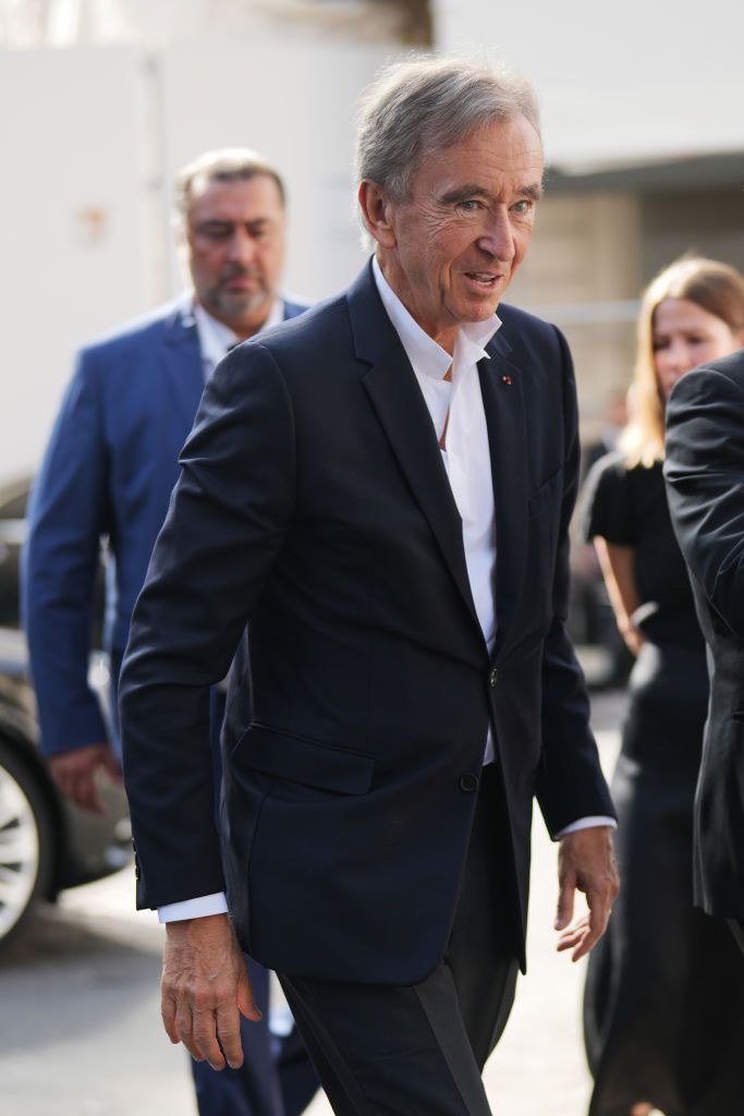 PARIS, FRANCE - OCTOBER 02: Bernard Arnault wears a navy blue blazer jacket, a white shirt, outside Louis Vuitton , during the Womenswear Spring/Summer 2024 as part of Paris Fashion Week on October 02, 2023 in Paris, France. (Photo by Edward Berthelot/Getty Images)