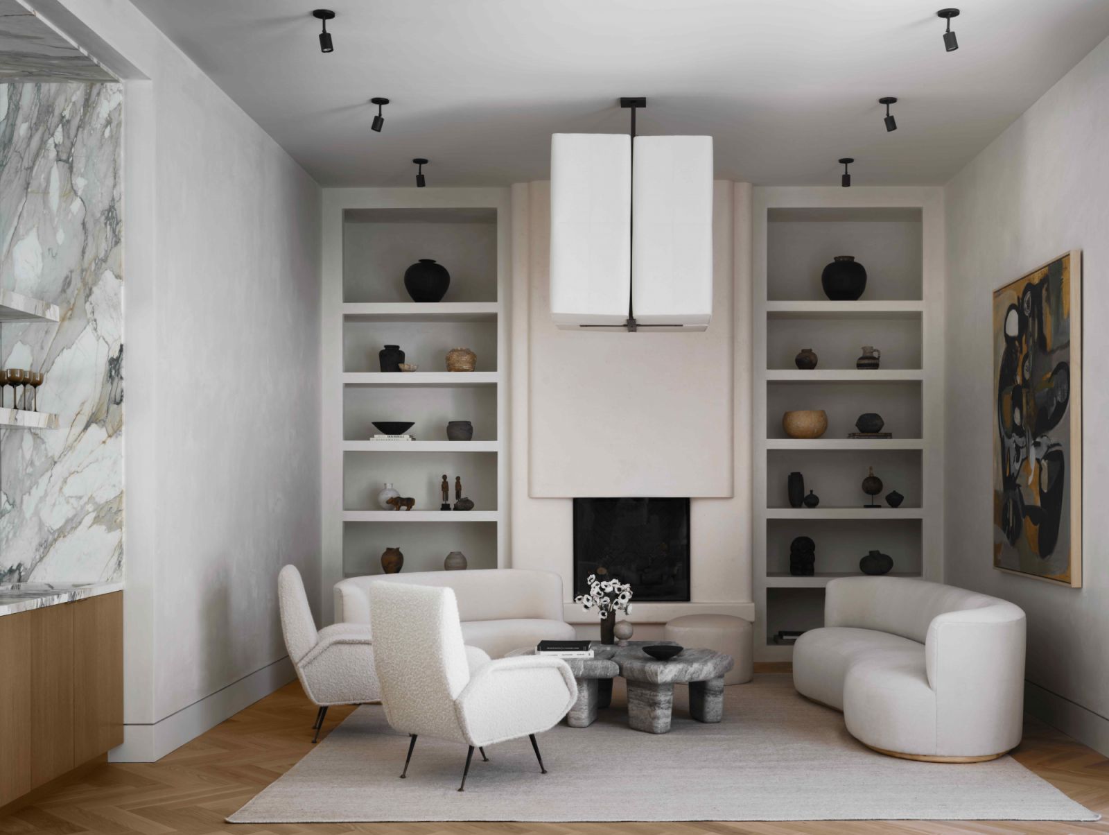 The living room fireplace carved from a two-ton block of Paloma Limestone (Photo: Douglas Friedman)