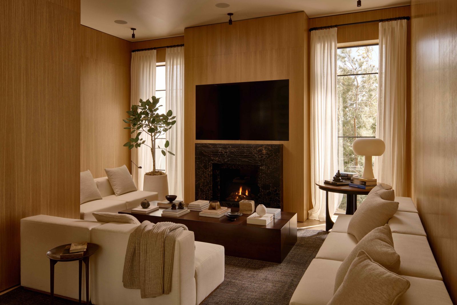 The white oak panelled media room exudes warmth (Photo: Nils Timms)