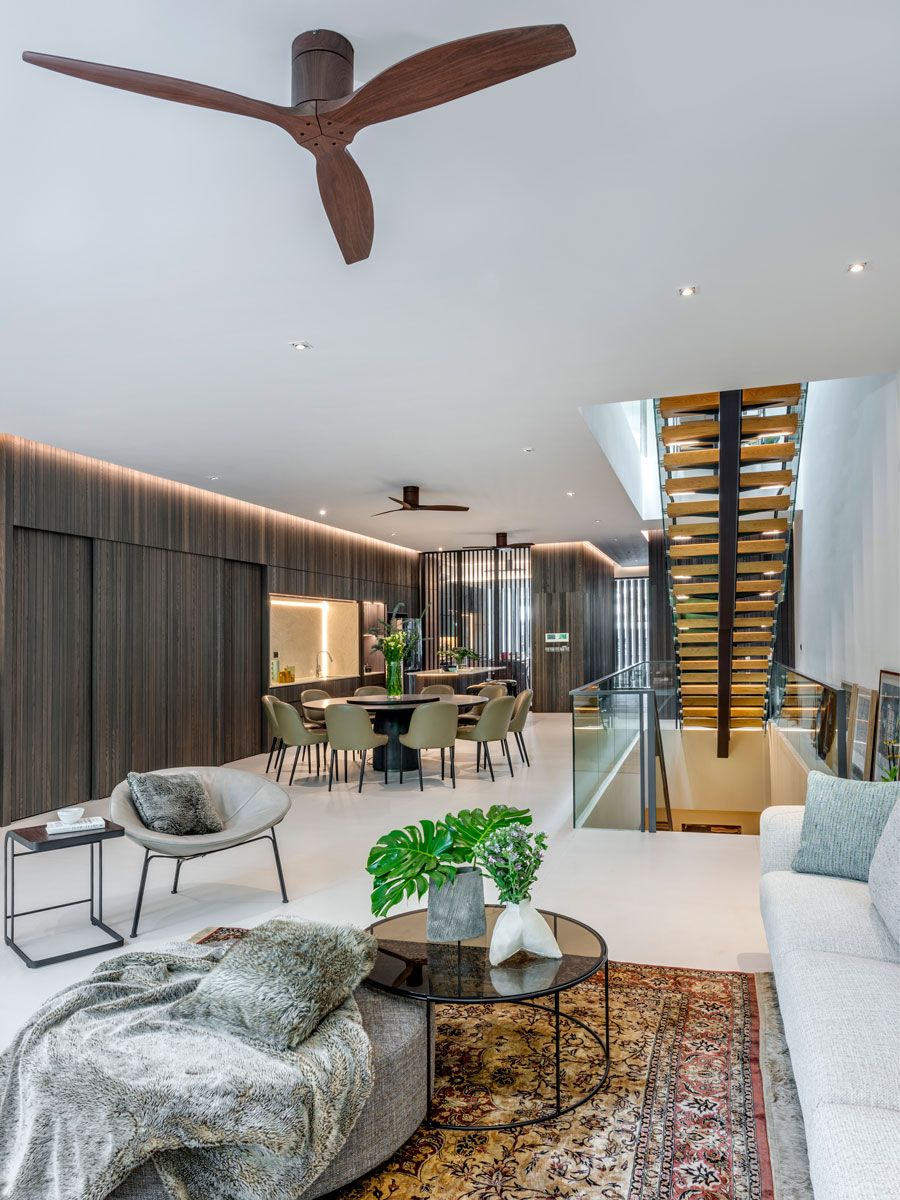 The family’s existing furnishings were complemented with new sofas from King Living and a dining table from Italian brand Lema