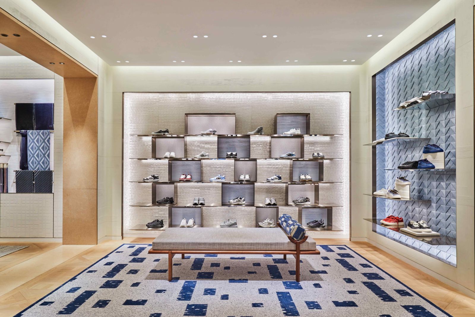 An interplay of patterns on walls and shelving backdrops (Photo: Dior)