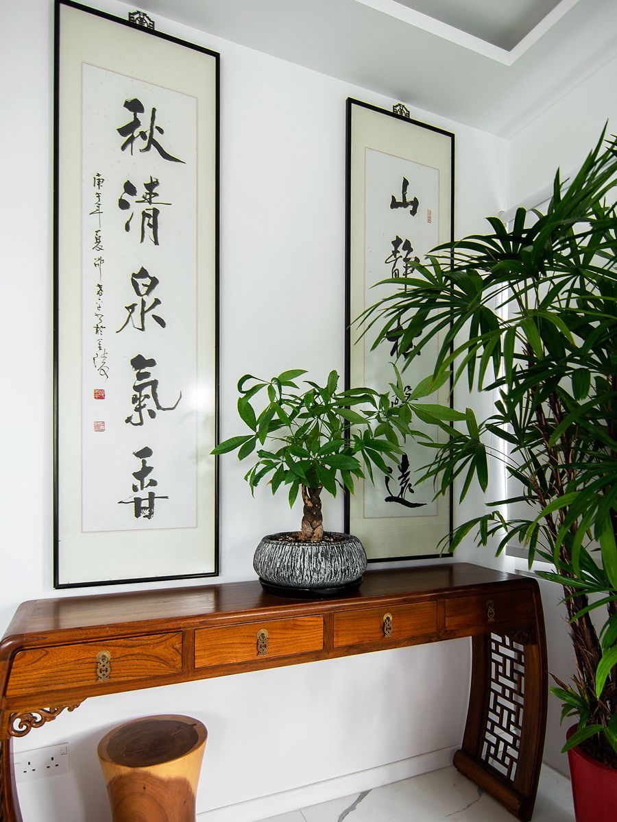 Another corner of the dining room that showcases the owner's antiques collection