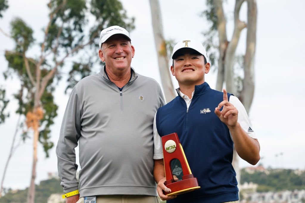 CARLSBAD, CALIFORNIA - MAY 27: Hiroshi Tai of the Georgia Tech Yellow Jackets celebrates his individual championship with head coach Bruce Heppler of the Georgia Tech Yellow Jackets after stroke play concludes during the Division I Men's Golf Championship held at Omni La Costa Resort & Spa on May 27, 2024 in Carlsbad, California. (Photo by C. Morgan Engel/NCAA Photos via Getty Images)