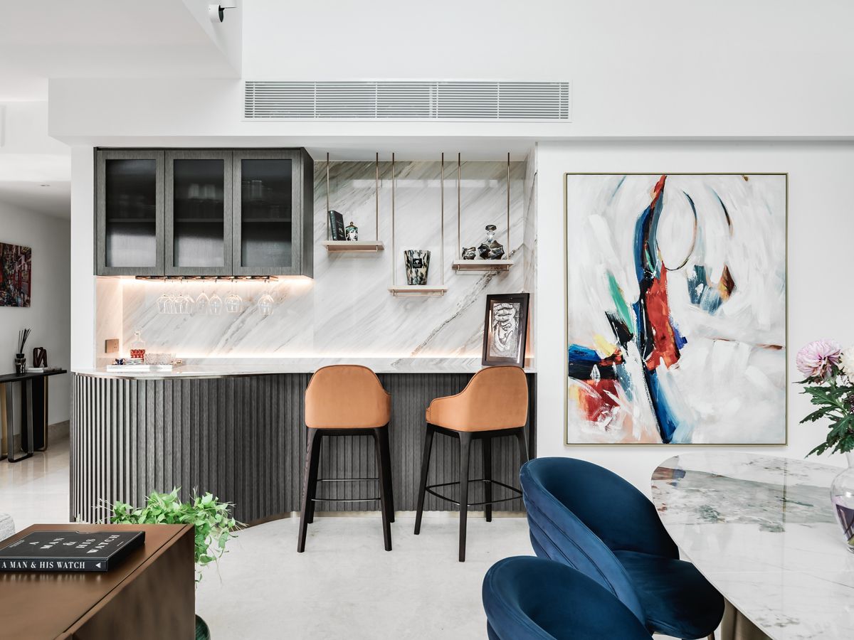 Backlit details bring a hint of elegance to this bar area