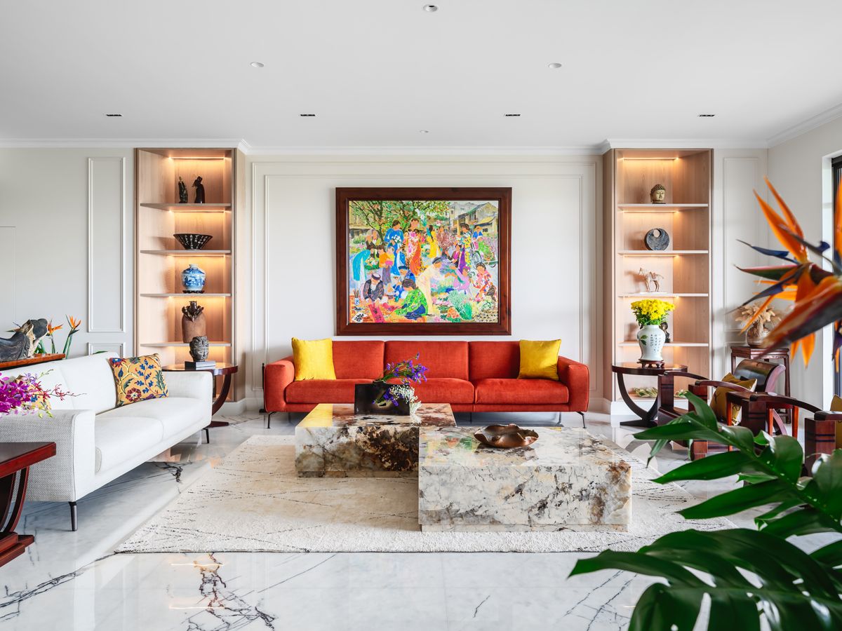 The owner’s art collection enlivens this home’s off-white scheme