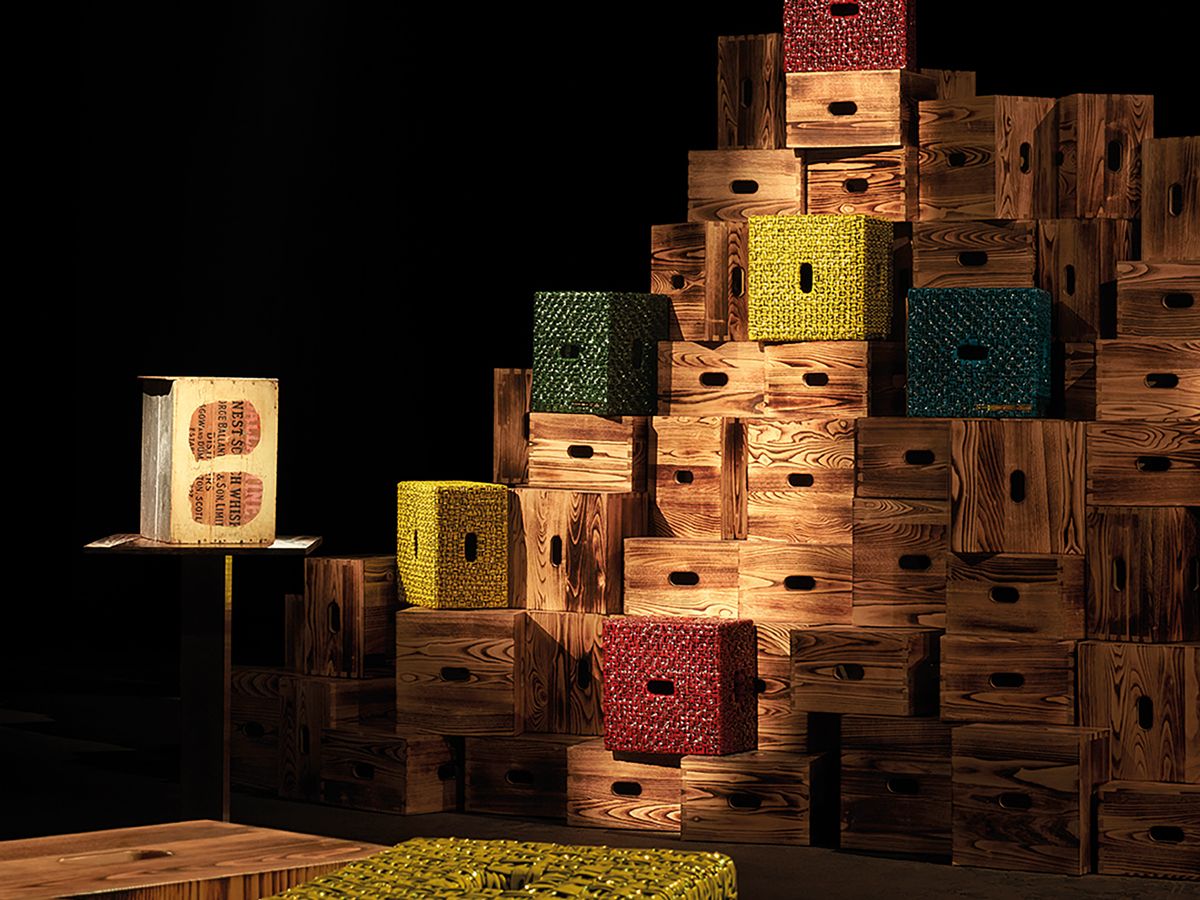 The original Le Corbusier DIY crate stool surrounded by the brand’s newer iterations