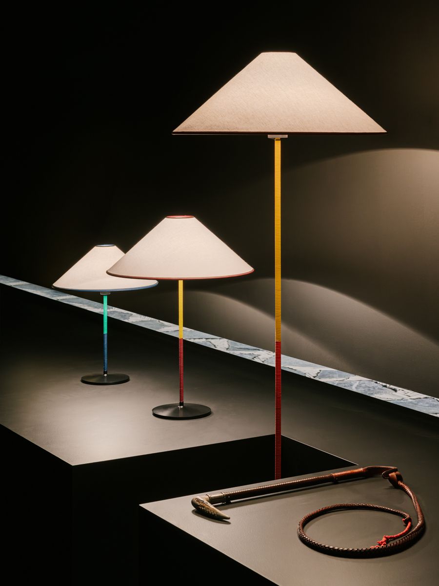 A showcase of Hermès's lamps with posts in colour-block