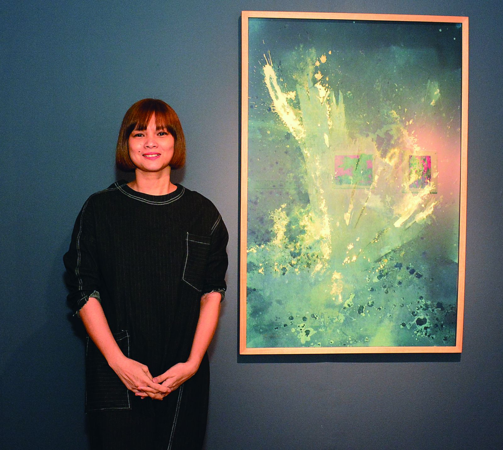 Corinne de San Jose, interdisciplinary media artist based in the Philippines, attends the exhibit’s launch
