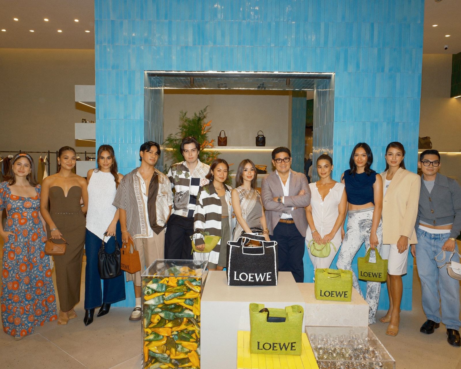 Xandra Rocha Araneta, Angelique Manto, Max Collins, David Guison, LA Aguinaldo, Laureen Uy, Heart Evangelista, Anton Huang, Anne Curtis, Bea Soriano Dee, Sarah Lahbati, and Chris Nick attend Loewe Paula's Ibiza 2024 Launch at Greenbelt 3