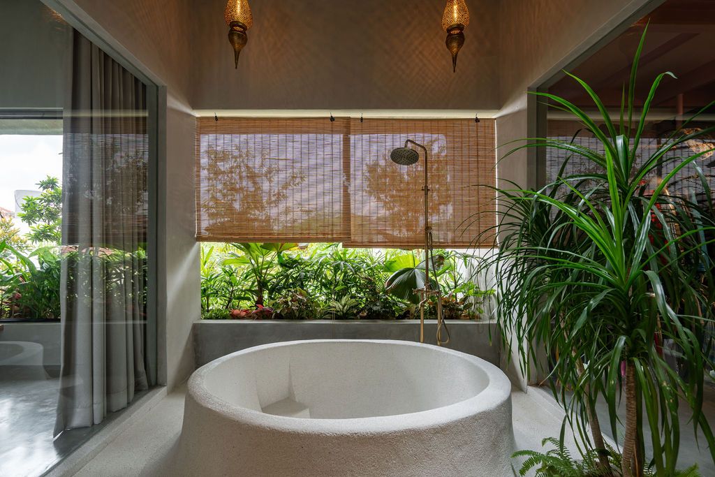 The round bathtub was cast from concrete