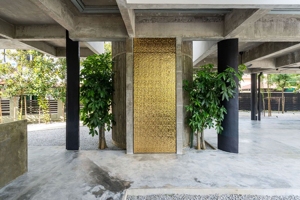 A brass accent amid the concrete