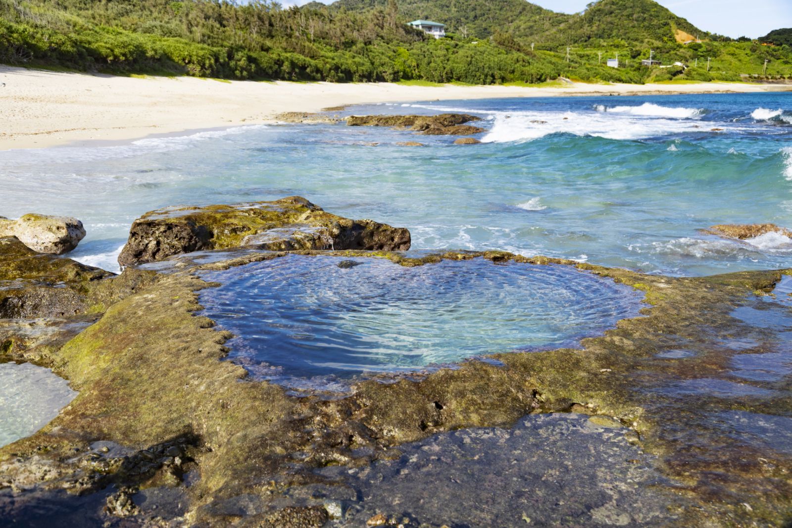 Heart Rock is a natural heart-shaped rock pool.It is located on the beach of Amami oshima island.