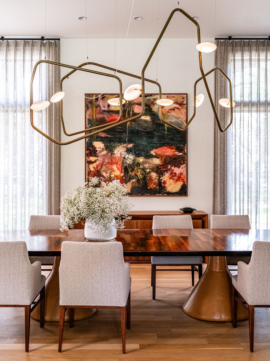 The Palindrome lamp’s spartan form contrasts against the bold brushstrokes of Fiona Weedon’s Tears and Flowers (Photo: Robert Tsai)