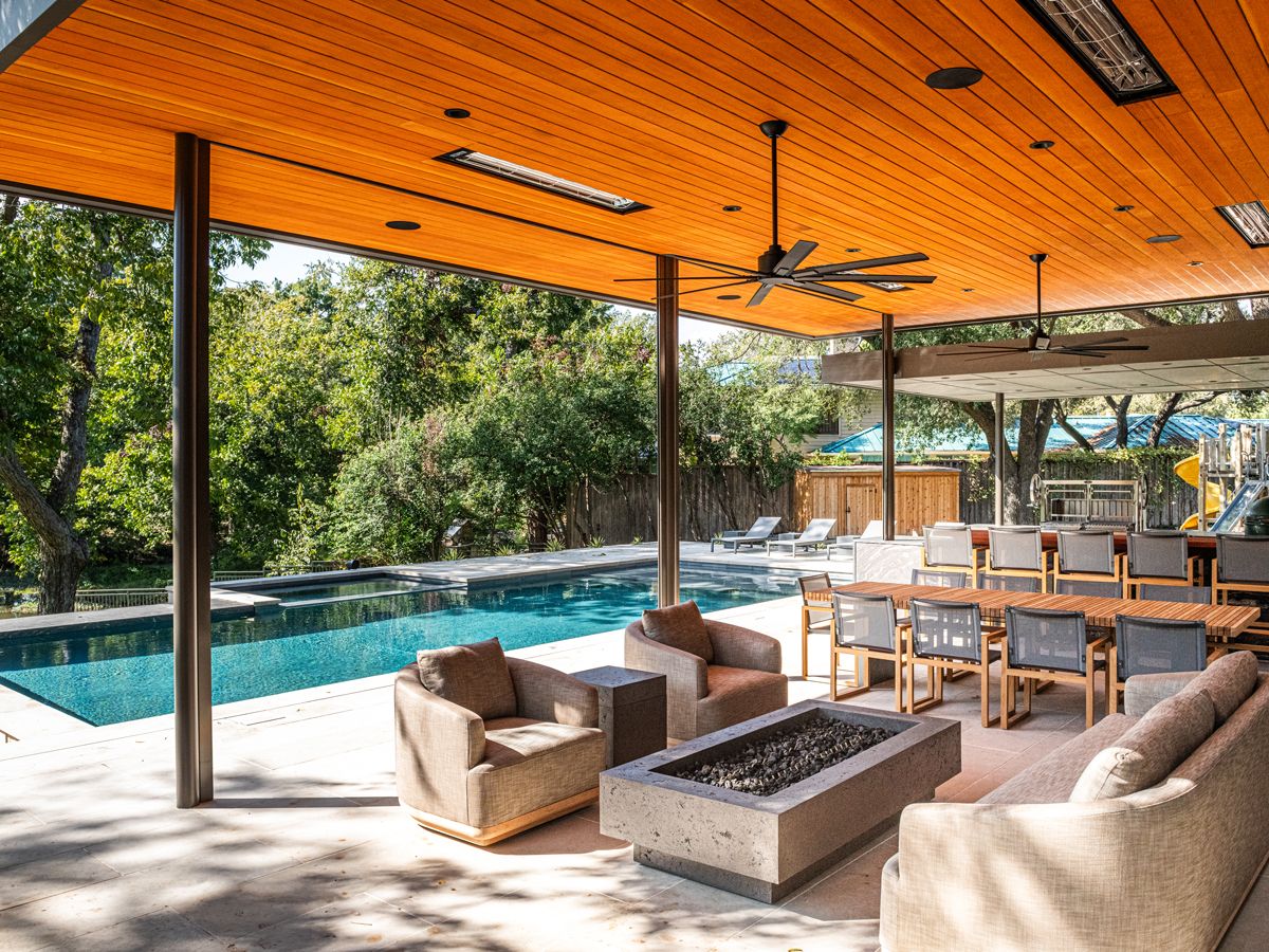 Reddish wood tones overhead act as a striking counterpoint to the pale flooring (Photo: Robert Tsai)