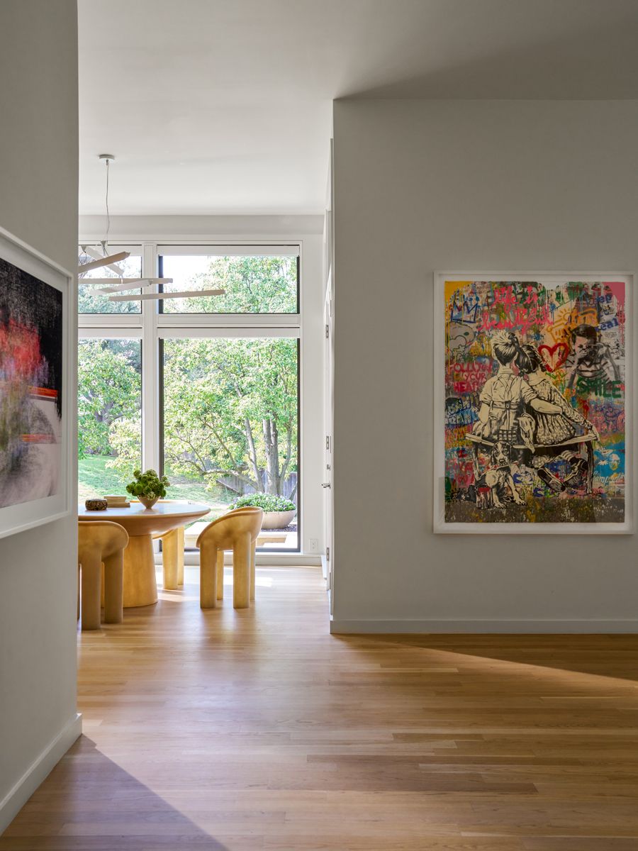 A selection of artworks infuses the home’s neutral scheme with energy and colour (Photo: Nathan Schroder)