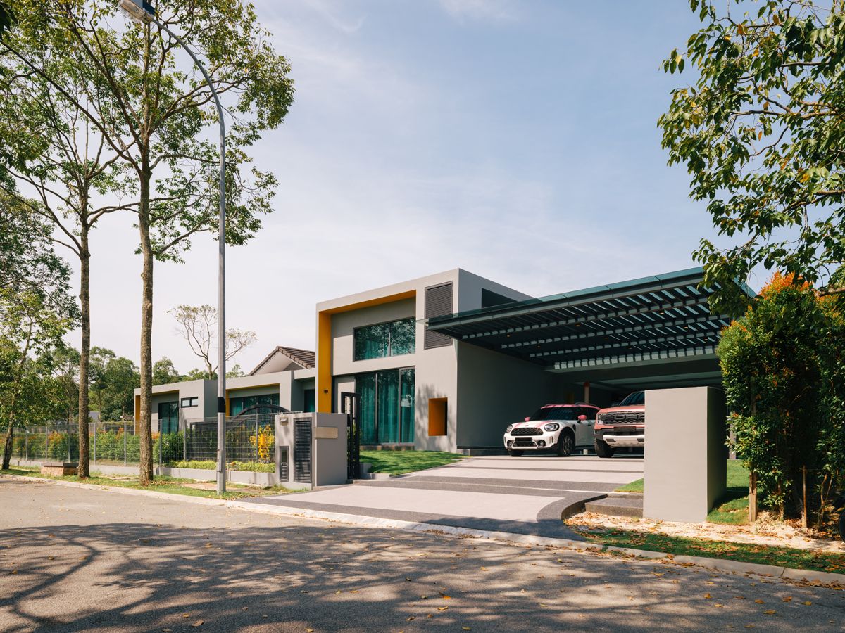 The house stands on a leafy street in Johor Bahru’s Leisure Farm development