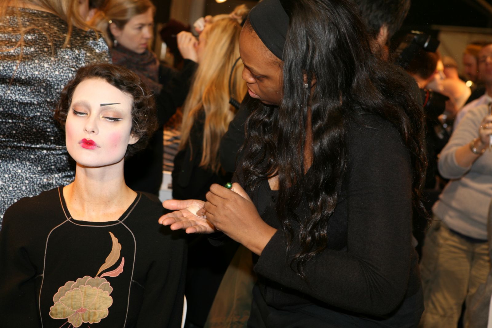 Model Shalom Harlow (L) and makeup artist Pat McGrath backstage at Dior's spring 2007 haute couture runway show at the Polo de Paris. (Photo by Delphine Achard/WWD/Penske Media via Getty Images)