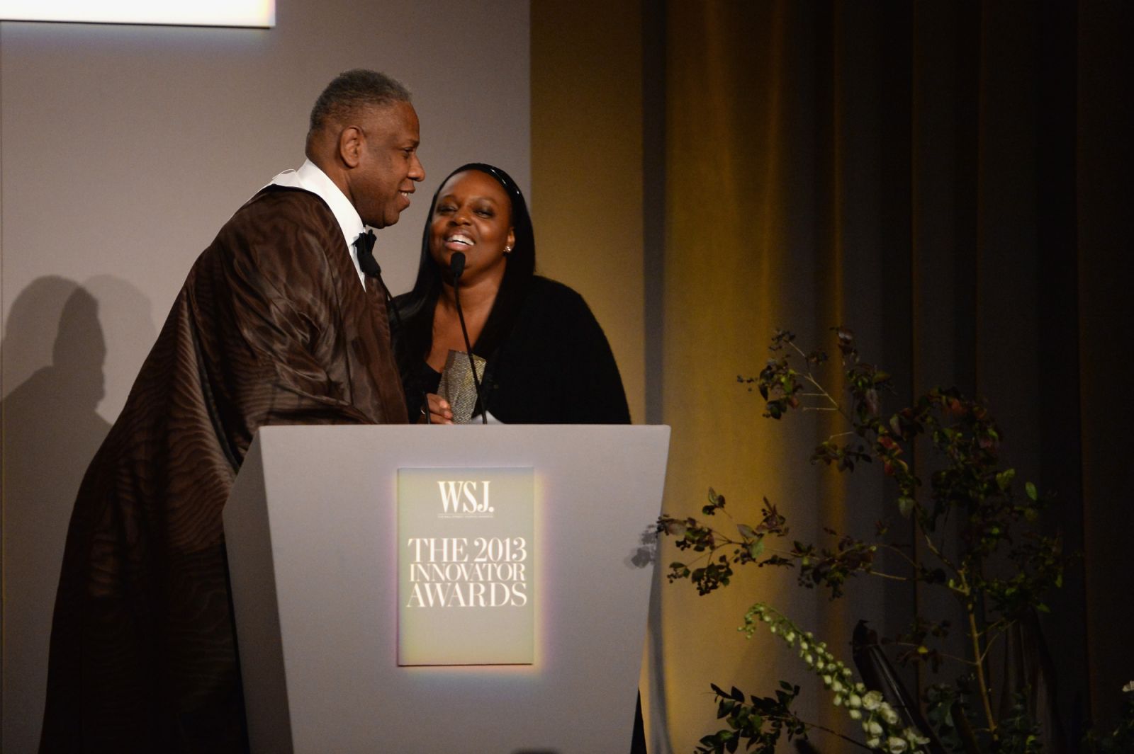 NEW YORK, NY - NOVEMBER 06: VOGUE Editor-at-large André Leon Talley presents an award onstage to Fashion Innovator Pat McGrath at the WSJ. Magazine's "Innovator Of The Year" Awards 2013 at The Museum of Modern Art on November 6, 2013 in New York City. (Photo by Dimitrios Kambouris/Getty Images)