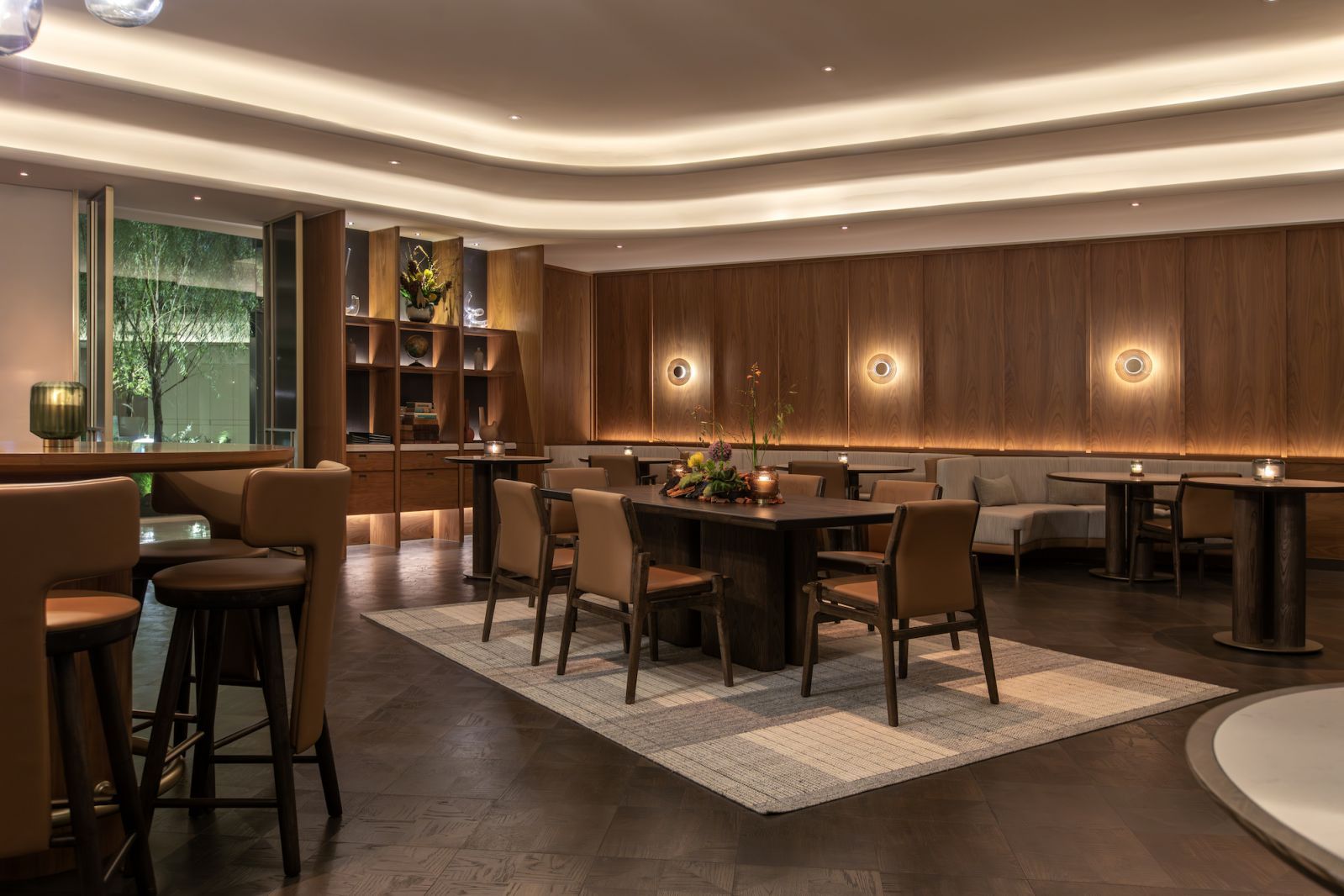 Timber-panelled walls and dark wood flooring, complemented by handcrafted wall coverings and curated artworks (Photo: Potager)