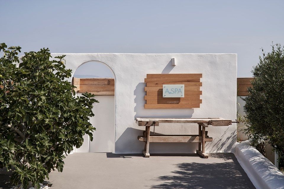 Kirini's whitewashed, textured exterior is infused with elements of vernacular architecture