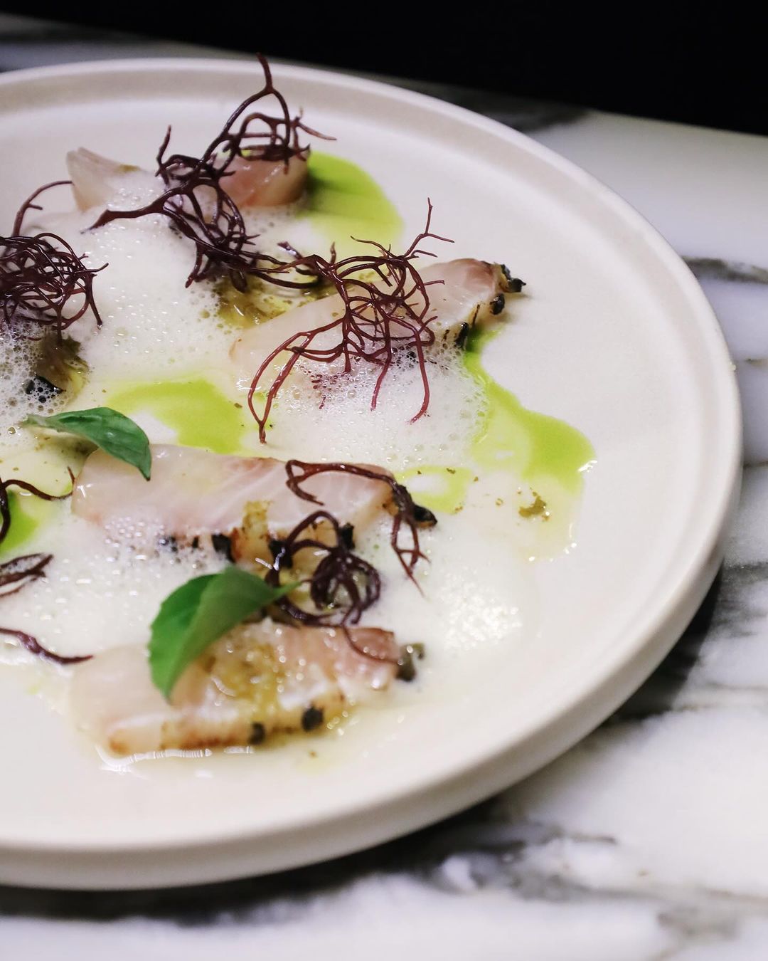 Striped jack ceviche with Thai basil foam (Photo: Instagram / @unwinedplus)