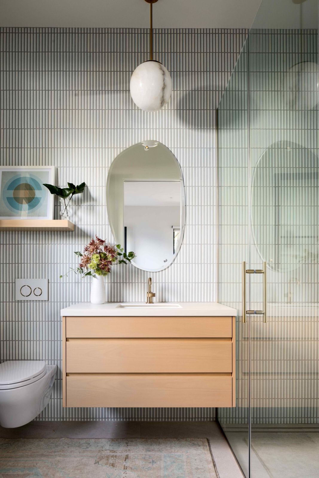 Sleek, clean lines in one of the six full bathrooms