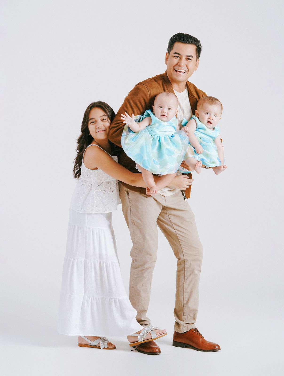 Fabio Ide with his daughters Danie, Maya and Luna