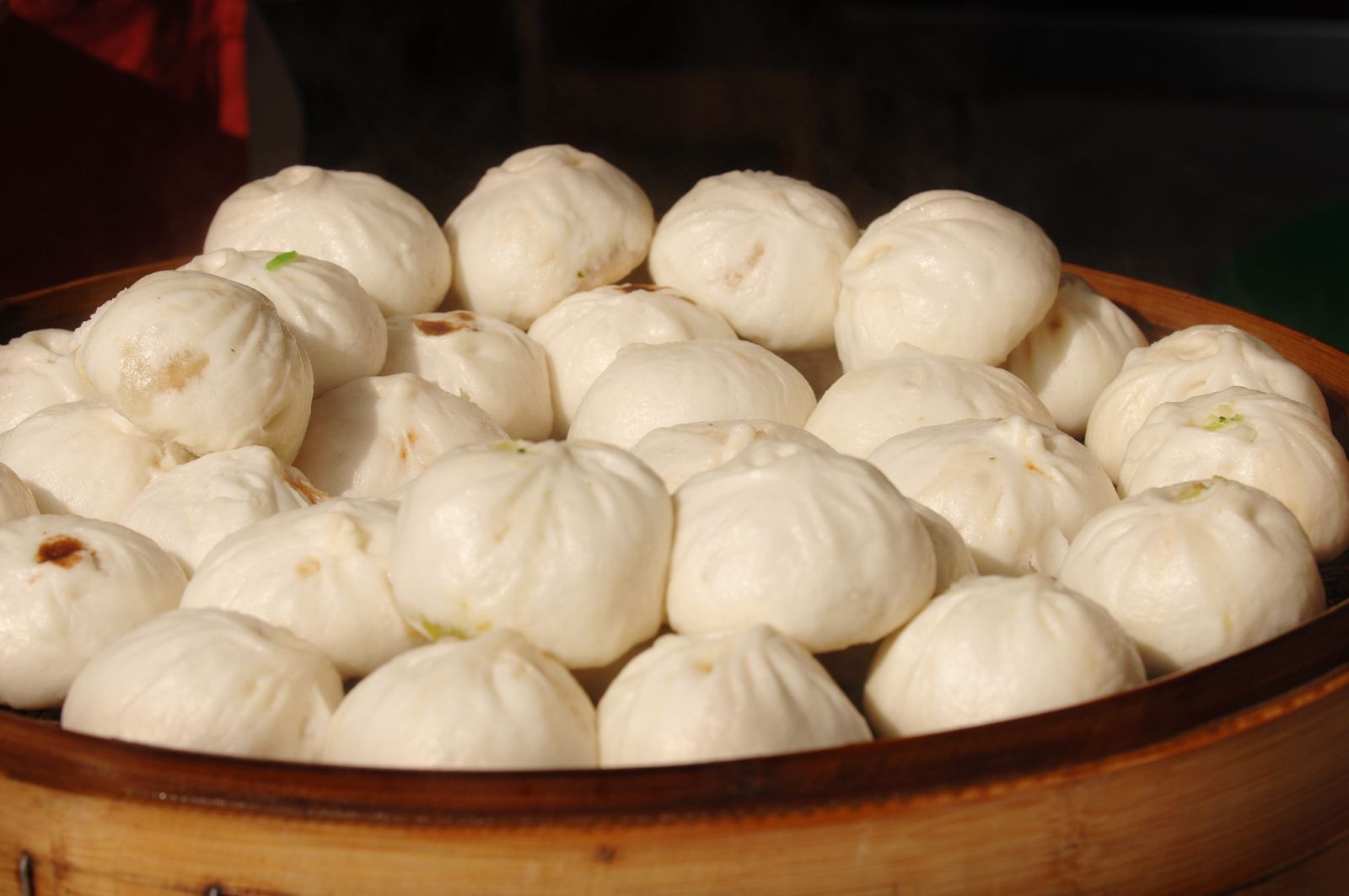 The typical wooden pot for cooking steamed buns. Shanghai, China, Asia. (Photo by: Paolo Picciotto/REDA&CO/Universal Images Group via Getty Images)