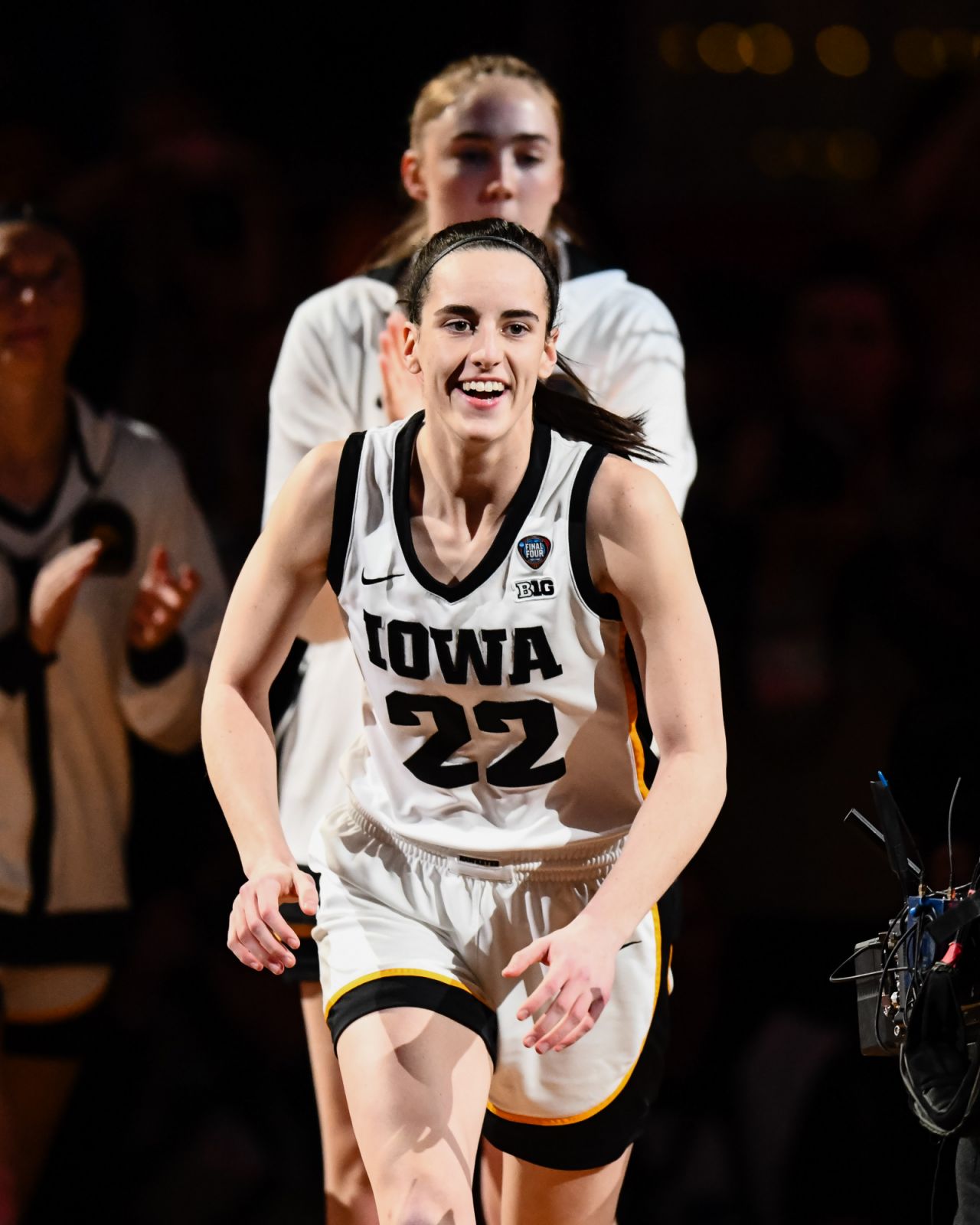 Caitlin Clark #22 of the Iowa Hawkeyes is introduced prior to the start of a game against the Connecticut Huskies in the NCAA Women's Basketball Tournament Final Four semifinal game between Connecticut and Iowa (Photo: Thien-An Truong/ISI Photos/Getty Images)