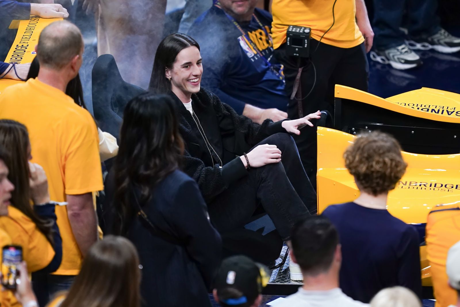 Caitlin Clark of the Indiana Fever participates in pre-game festivities before game three of the Eastern Conference First Round Playoffs between the Milwaukee Bucks and the Indiana Pacers (Photo: Dylan Buell/Getty Ima