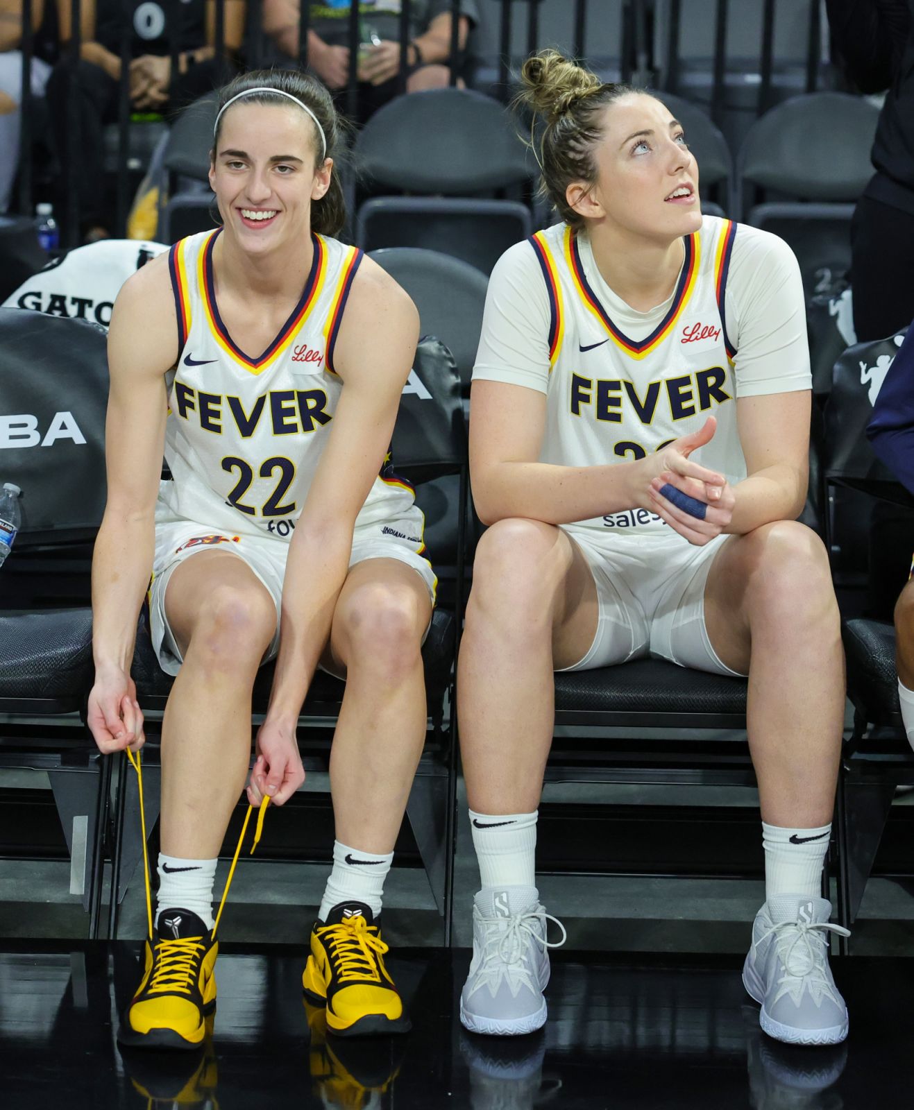 Caitlin Clark #22 and Katie Lou Samuelson #33 of the Indiana Fever wait to be introduced before their game against the Las Vegas Aces in Las Vegas (Photo: Ethan Miller/Getty Images)