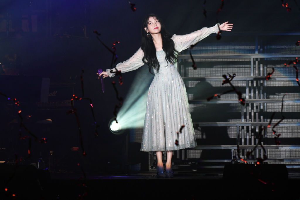 NEW TAIPEI, CHINA - NOVEMBER 30: South Korean singer IU performs on the stage in concert on November 30, 2019 in New Taipei City, Taiwan of China. (Photo by VCG/VCG via Getty Images)