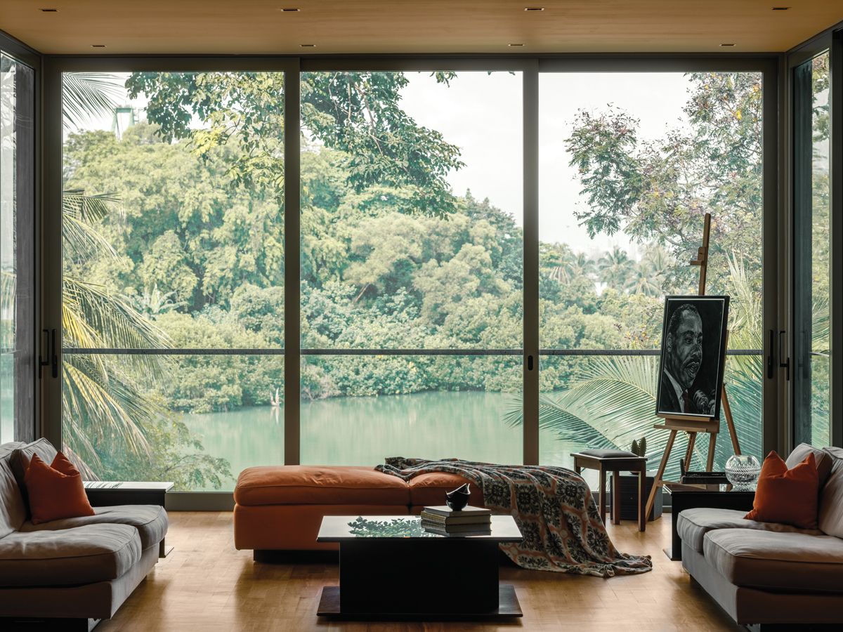 This basement studio has a picture window that frames the saltwater lake beautifully, making it the perfect spot for the wife’s artistic pursuits (Photo: Designworx Interior Consultant)
