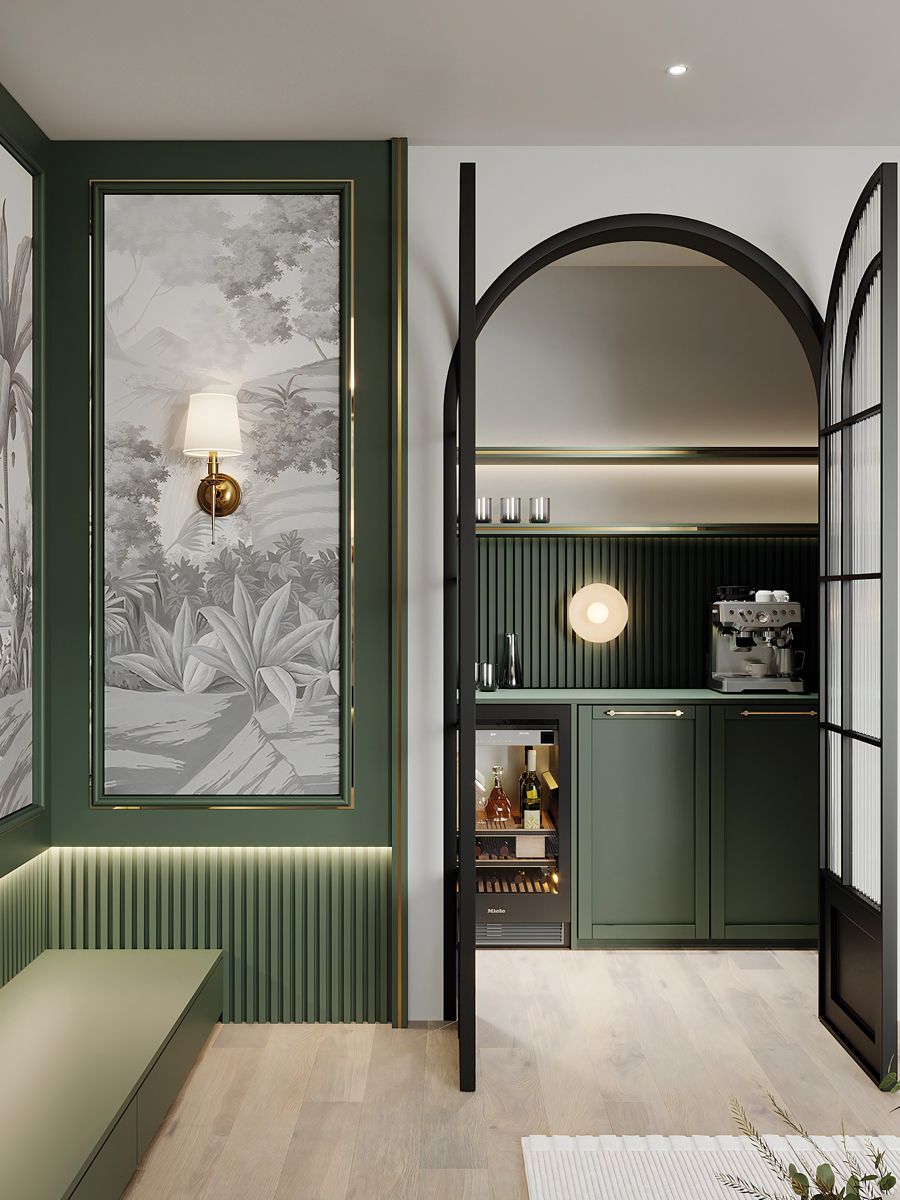 The fluted details and green cabinetry in the family room convey the abode’s art deco influences (Photo: LA Design Studio)