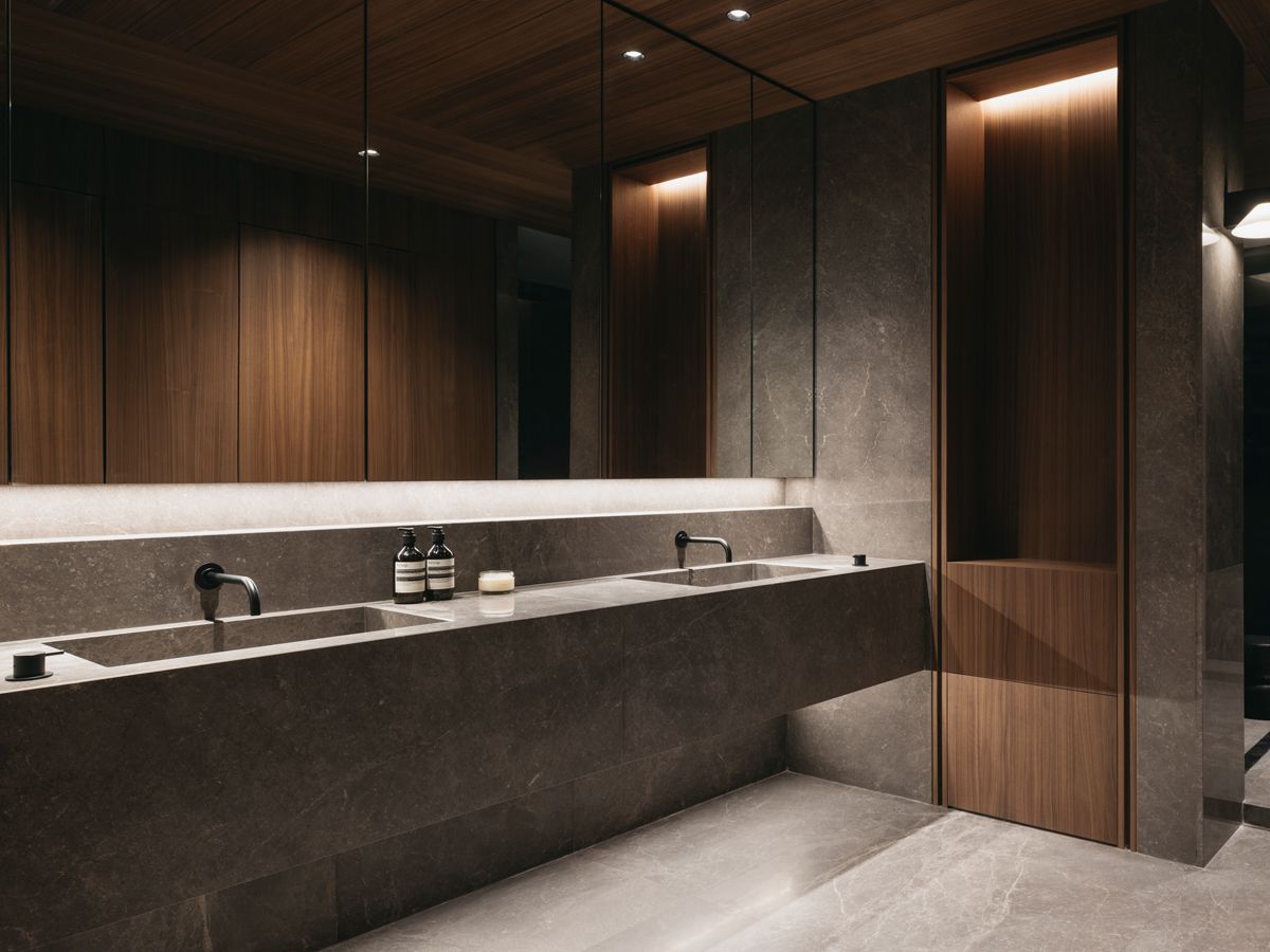 A powder room with elegant fixtures (Photo: Studio Periphery)