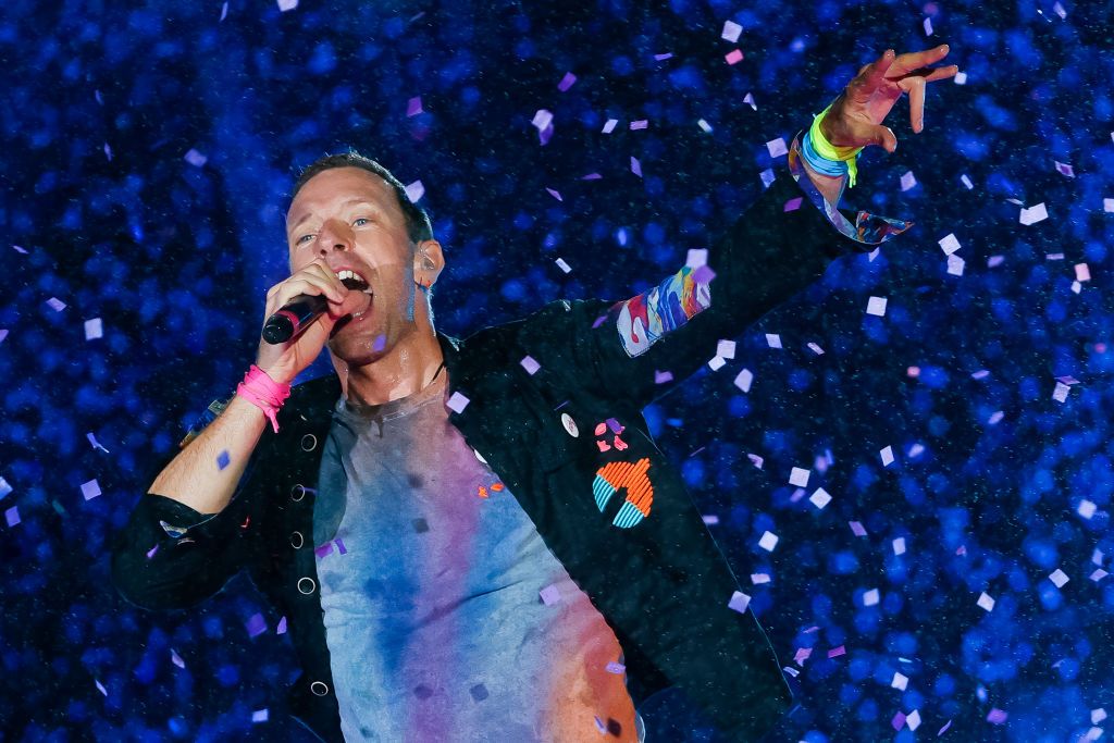 RIO DE JANEIRO, BRAZIL - SEPTEMBER 10: Chris Martin of the band Coldplay performs at the Mundo Stage during the Rock in Rio Festival at Cidade do Rock on September 10, 2022 in Rio de Janeiro, Brazil. The famous festival Rock in Rio returns after two years of cancellation due to COVID-19 pandemic. (Photo by Buda Mendes/Getty Images)
