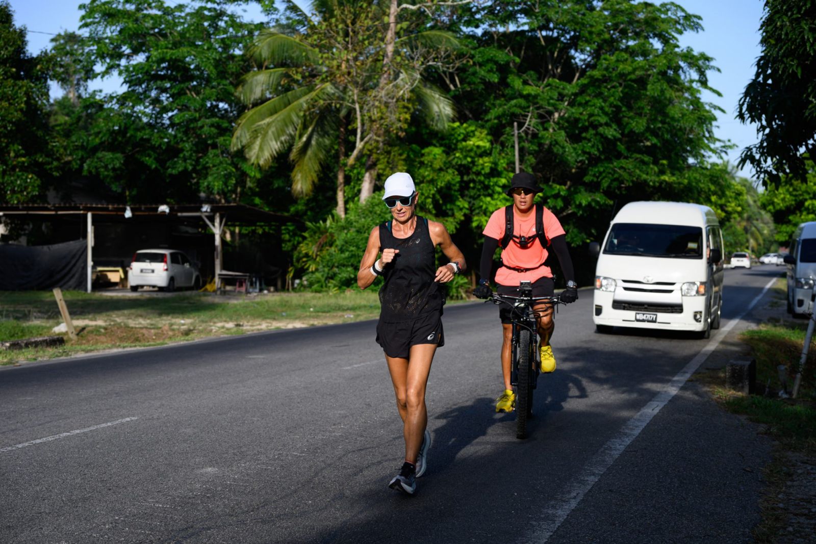 Natalie Dau running through Malaysia as part of Project 1000