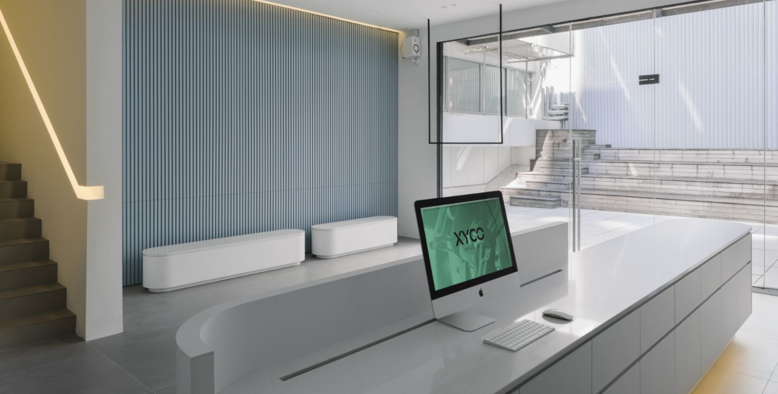 Clean lines and understated tones characterise the reception area (Photo: Form Practice)