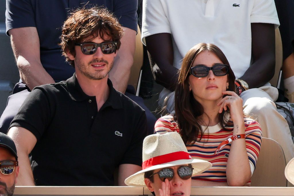 PARIS, FRANCE - JUNE 09: Logan Lerman and Ana Corrigan attend the 2024 French Open at Roland Garros on June 09, 2024 in Paris, France. (Photo by Stephane Cardinale - Corbis/Corbis via Getty Images)